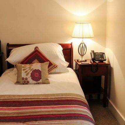 Elstead - Candeeiro de mesa AEGEAN 1xE27/60W/230V bronze